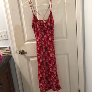 Calf length red spaghetti strap dress